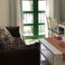 La Venecia de Canarias Puerto de Mogan room with sofa, dining table, and French doors to a balcony