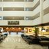 Centara Life Hotel Mae Sot lobby with open atrium, seating area, and reception desk in Mae Sot
