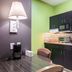 Studio 6 Bay City, TX kitchenette with microwave, coffee maker and table in Bay City