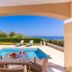 Carme Villas, Rethymno: private pool terrace with lounge chairs and sea view