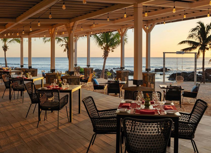 The Westin Turtle Bay Resort & Spa, Mauritius terrace dining by the ocean at sunset in Balaclava