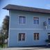 Gästehaus Klug in Sankt Stefan ob Stainz, blue two-story guesthouse exterior with multiple windows