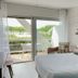 Hôtel Saint-Clair, côté Plage room with balcony and sliding glass doors in La Grande-Motte