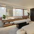 JW Marriott Gold Coast Resort & Spa spa treatment room in Surfers Paradise with two massage tables and seating