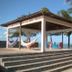 Beach Hotel Jacuma in João Pessoa with hammocks and colorful chairs on an open-air oceanfront pavilion
