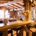 Parkhotel Luise in Bad Herrenalb rustic lodge-style lounge with wooden table, beams, and animal decor
