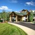 Eagleridge Lodge & Townhomes in Steamboat Springs with alpine-style exterior and landscaped drive
