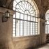Great Eastern Hotel Quezon City in Manila, arched corridor with large windows and benches