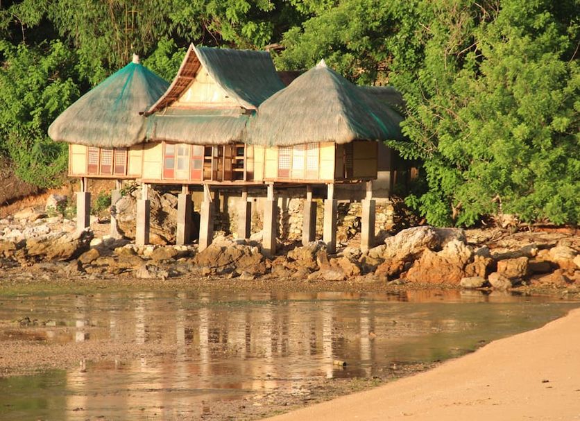 Palawan Sandcastles The Beach House in Busuanga, beachfront cottage on stilts by the shore