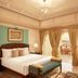 Taj Fateh Prakash Palace Udaipur bedroom with lake-view terrace and open curtains