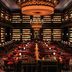 The Reserve at Park MGM in Las Vegas lounge with red velvet seating and dramatic chandeliers