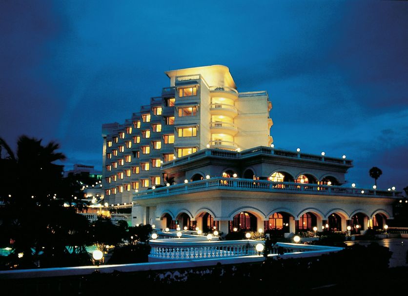 The Gateway Hotel Beach Road in Visakhapatnam at dusk with lit balconies and arched terraces
