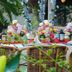 Hibiscus Garden Resort in Puerto Princesa, tropical garden dining table with colorful flower arrangements