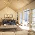 La Casa del Camino in Laguna Beach lounge with vaulted wood ceiling, fireplace, sofa, and French doors to patio