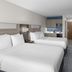 Holiday Inn Express & Suites Montrose - Black Canyon Area guest room with two beds and kitchenette