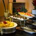 Apollo Hotel Johannesburg buffet table with fruit, appetizers and pastries