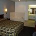 Texas Inn And Suites At La Joya room with two beds and a soaking tub in the room