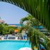 Franklyn D. Resort & Spa in Runaway Bay with pool, palm trees, and ocean view