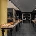 Zijin Hotel Belgrade buffet dining area in Belgrade with breakfast tables and food displays
