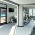 Courtyard by Marriott Sacramento Airport Natomas fitness room with treadmills, weights and poolside access in Sacramento