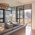 Woodstock Way Hotel in Woodstock: modern suite with open doors to a private balcony and forest view