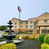 Fairfield Inn & Suites by Marriott Clarksville exterior with fountain and landscaped entrance