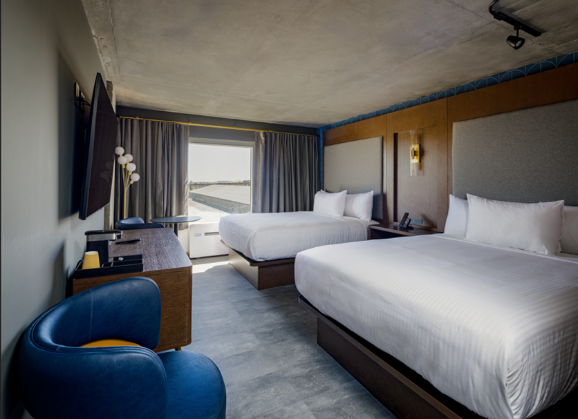 Bally's Baton Rouge Hotel guest room with two beds and a river view balcony