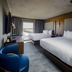 Bally's Baton Rouge Hotel guest room with two beds and a river view balcony