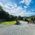 Dolgun Uchaf Guesthouse in Dolgellau with a gravel drive and sweeping countryside views