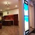Oasey Beach Hotel in Bentota lobby with leather seating, chandeliers and front desk area