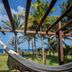 Pousada Santú Noronha in Fernando de Noronha, hammock on deck with palm trees and ocean view
