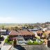 The Brudenell Aldeburgh in Ipswich overlooking rooftops toward the coast and open sea