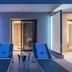 AZ Hotel Vague D'or, Algiers: modern balcony with two blue lounge chairs and small table