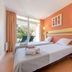 Club Belambra Le Vidourle in Le Grau-du-Roi: twin beds beside a balcony with garden view