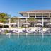 Azerai Ke Ga Bay, Phan Thiet: oceanfront resort pool with loungers and umbrellas