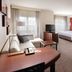 Residence Inn by Marriott Dallas Plano/The Colony room with sofa, desk, bed, TV and dining table