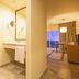 Krystal Puerto Vallarta bathroom with double vanity, shower, and balcony view in Puerto Vallarta