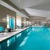 Residence Inn by Marriott Texarkana indoor pool with lounge chairs and high ceiling