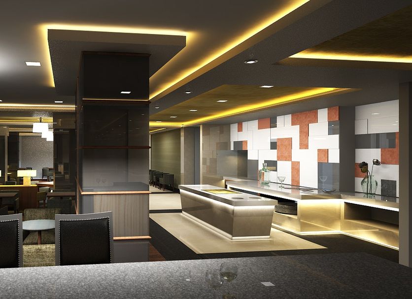Oakwood Residence Kapil Hyderabad lobby lounge with modern seating, illuminated reception desk, and feature wall