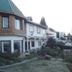 Hosteria Las Amapolas in San Carlos de Bariloche, exterior with garden and roadside view