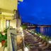 Hotel Antea - By The Sea in Sozopol with balcony seating overlooking the sea at dusk