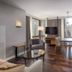 Wyndham Midtown 45 king room in New York with city views, dining table and TV