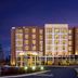Four Points by Sheraton Raleigh Durham Airport in Morrisville at dusk, exterior hotel entrance lit up