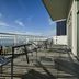 Residence Inn by Marriott Myrtle Beach Oceanfront balcony with tables and chairs overlooking the ocean