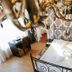 Vila Vidalis in Cluj Napoca, room with wrought-iron bed, patterned headboard wall and desk