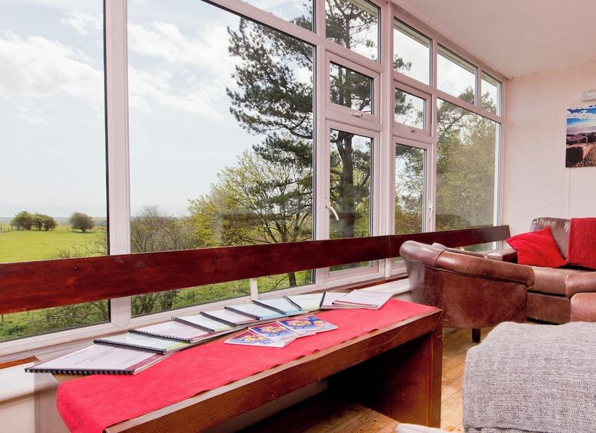 Yha Truleigh Hill, Shoreham-by-Sea lounge with large windows and countryside views