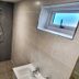 Deepcut Lodge Bed & Breakfast Self Service in Camberley bathroom with walk-in shower and frosted window