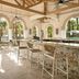 Marriott's Lakeshore Reserve in Orlando, open-air bar with mosaic counter, stools and arched garden views