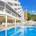 Ideal Pearl Hotel Adults Only in Marmaris with outdoor pool, sun loungers and white balconies