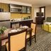 Homewood Suites by Hilton Chicago Downtown/Magnificent Mile suite with kitchen, seating area, and city view